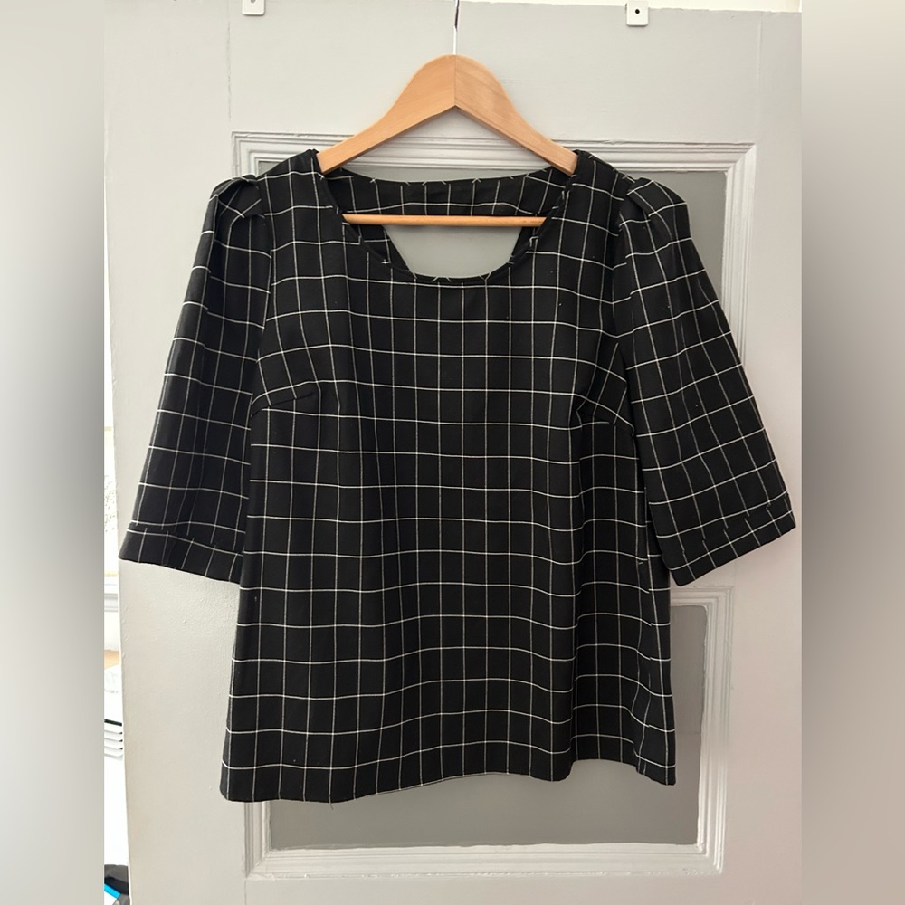 Black puff sleeve grid shirt with cute cutout detail